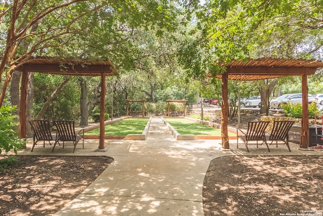 view of property's community featuring a pergola