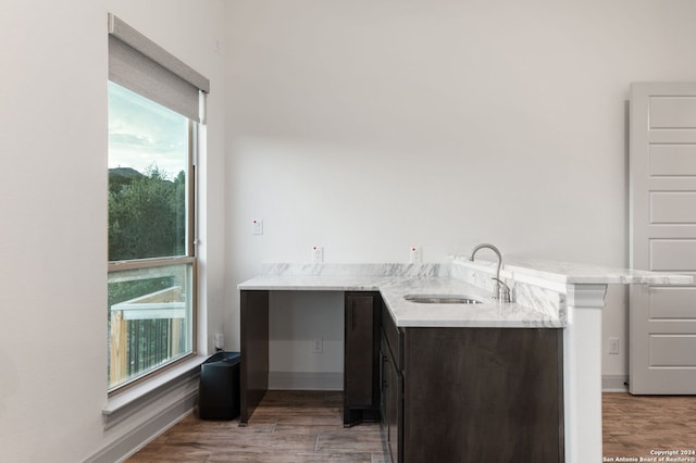 interior space with hardwood / wood-style floors and vanity