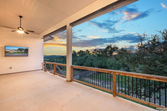 patio terrace at dusk with ceiling fan