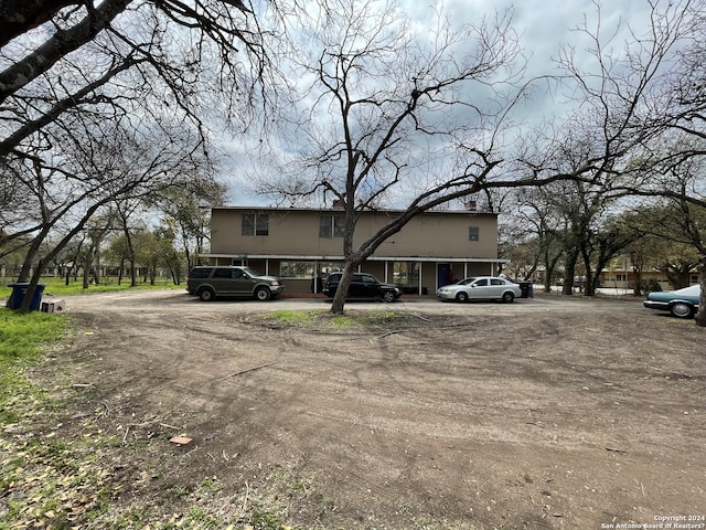 view of front of home with a carport