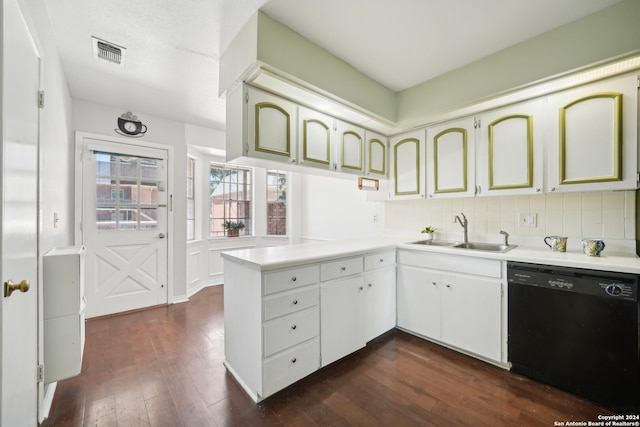 kitchen with decorative backsplash, dark hardwood / wood-style floors, sink, kitchen peninsula, and black dishwasher