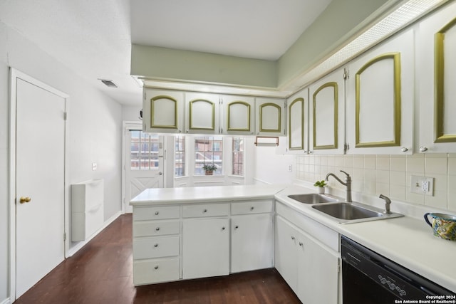 kitchen featuring dishwasher, decorative backsplash, dark hardwood / wood-style floors, sink, and kitchen peninsula