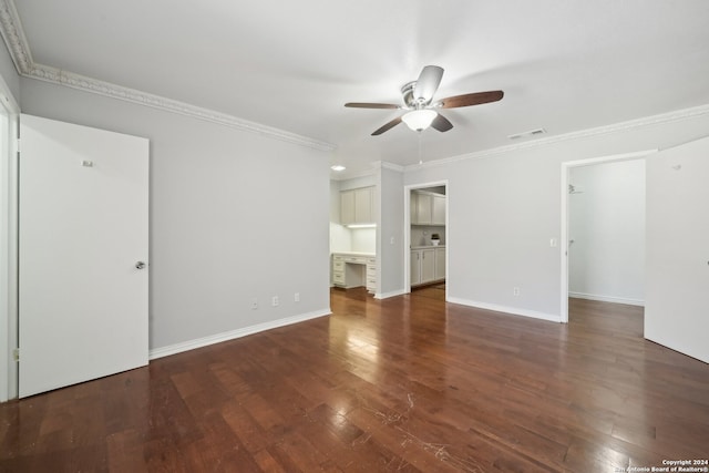 empty room with hardwood / wood-style flooring, crown molding, and ceiling fan