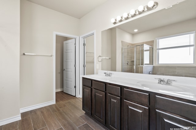 bathroom featuring vanity and walk in shower