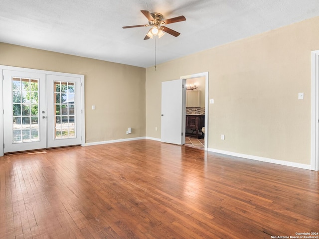 unfurnished living room featuring french doors, hardwood / wood-style floors, and ceiling fan