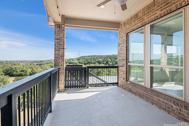 balcony featuring ceiling fan