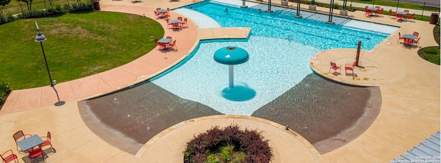 view of pool featuring a patio area