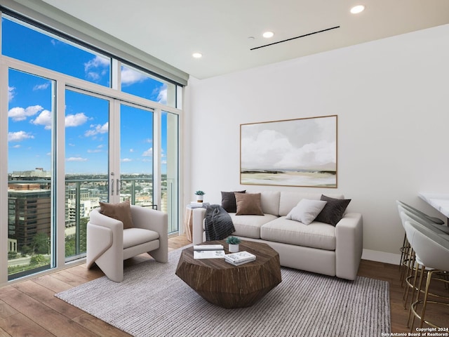 living room featuring hardwood / wood-style flooring and plenty of natural light