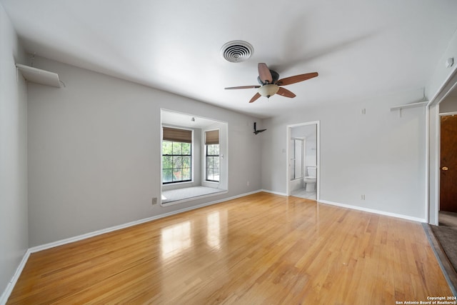 unfurnished room featuring ceiling fan and light hardwood / wood-style flooring