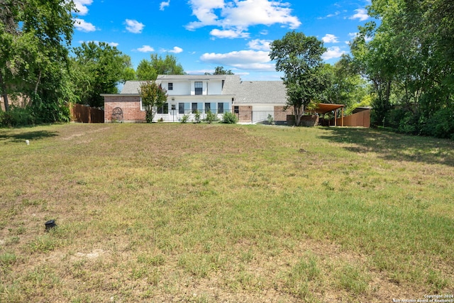 view of yard featuring fence