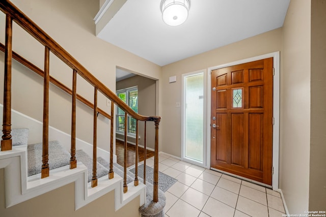 foyer with light tile patterned floors