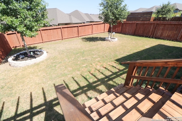 view of yard with a deck