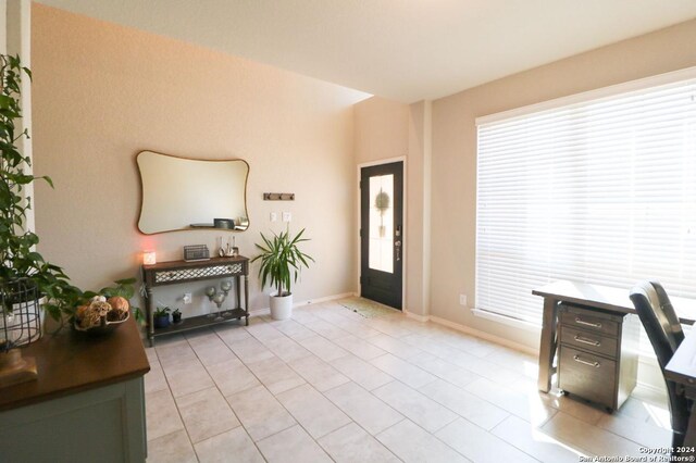 bathroom featuring tile patterned flooring, vanity, and shower with separate bathtub