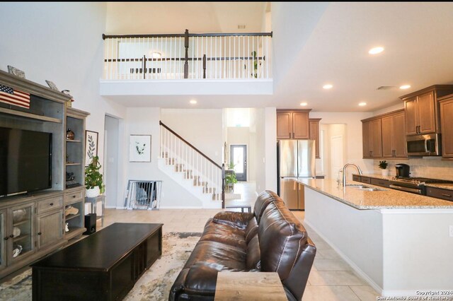 wooden terrace featuring an outdoor living space and ceiling fan