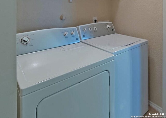 laundry room with washer and dryer