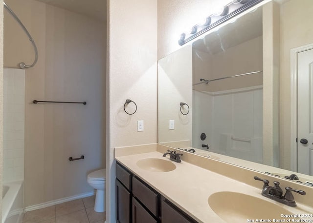 full bathroom featuring tile patterned flooring,  shower combination, vanity, and toilet