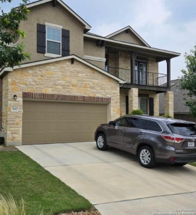 view of front of property with a balcony