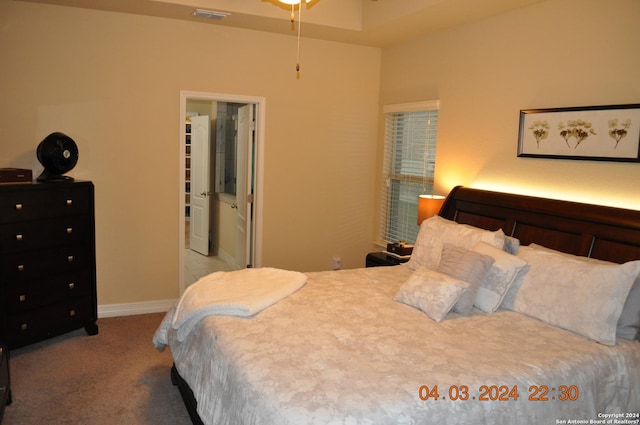 bedroom with baseboards, visible vents, and carpet flooring