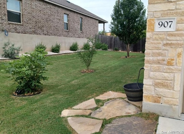 view of yard with fence