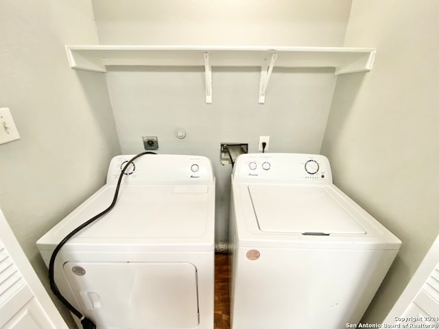 laundry area featuring washing machine and clothes dryer