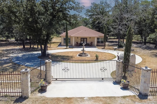 view of gate with fence