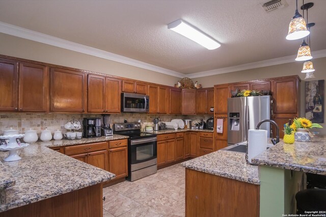 kitchen featuring appliances with stainless steel finishes, decorative backsplash, and stone counters