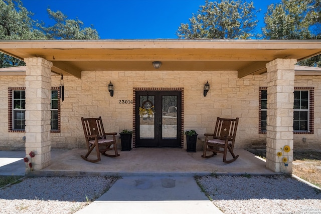 entrance to property featuring french doors