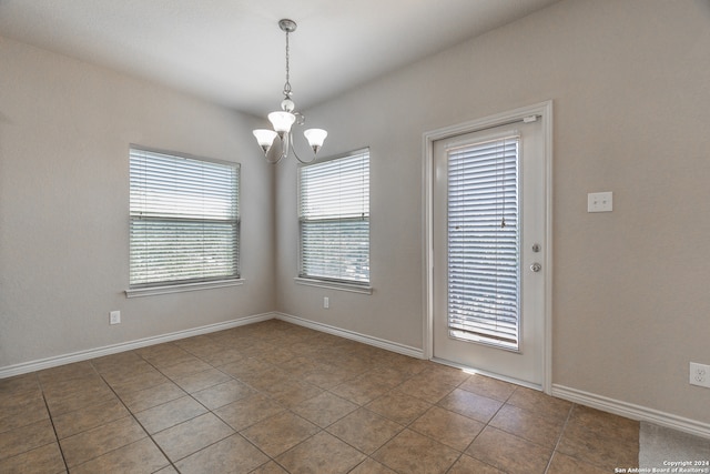 interior space with a chandelier