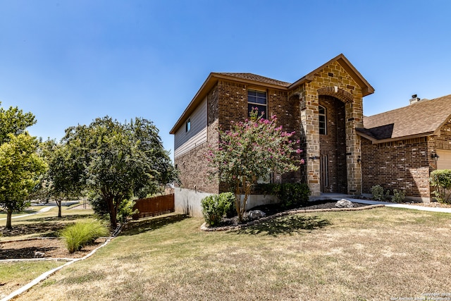 view of front facade with a front lawn