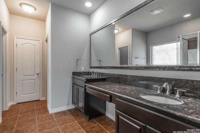 bathroom with vanity and tile patterned floors