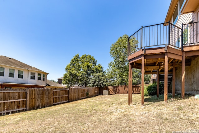 view of yard featuring a wooden deck