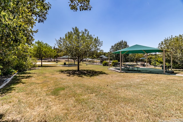 view of community featuring a gazebo and a lawn