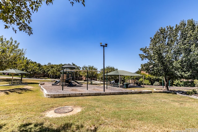 view of playground featuring a yard