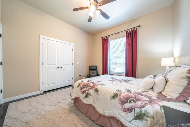 bedroom with a closet and ceiling fan