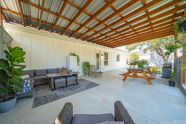 view of patio featuring area for grilling and an outdoor hangout area