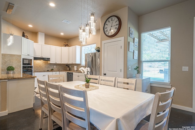 dining area with a chandelier