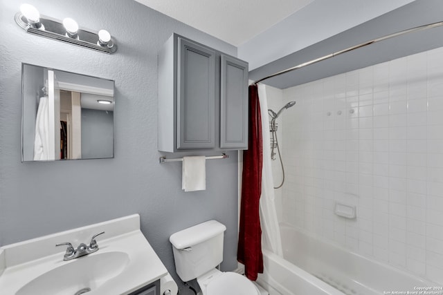 full bathroom featuring toilet, shower / tub combo, and vanity