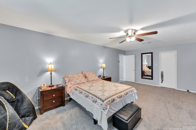 carpeted bedroom featuring ceiling fan