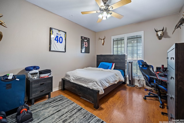 bedroom featuring ceiling fan and light hardwood / wood-style floors