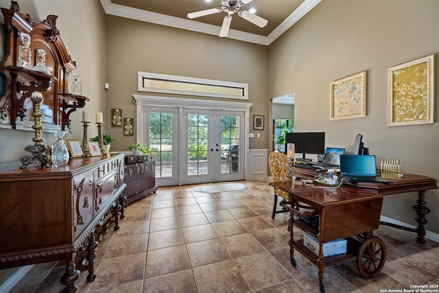 office area with french doors, a high ceiling, crown molding, tile patterned floors, and ceiling fan