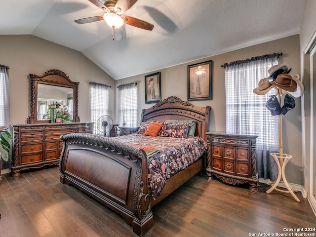 bedroom featuring ceiling fan, lofted ceiling, and hardwood / wood-style floors