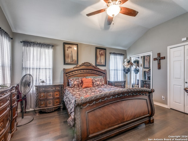 bedroom featuring ceiling fan, dark hardwood / wood-style floors, and lofted ceiling