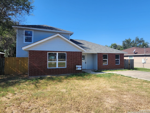 view of front of property with a front lawn