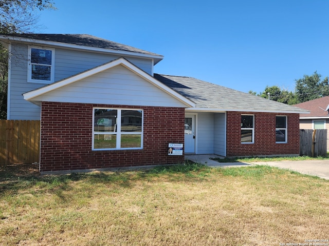 view of front of home with a front yard