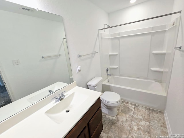 bathroom with baseboards, visible vents, toilet, tub / shower combination, and vanity