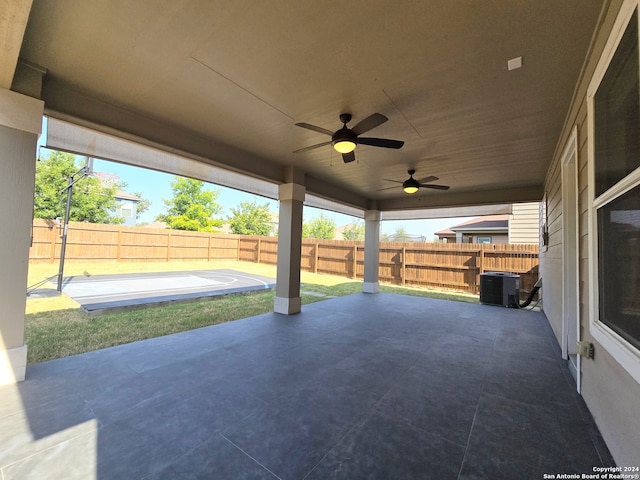 view of patio featuring ceiling fan and central AC