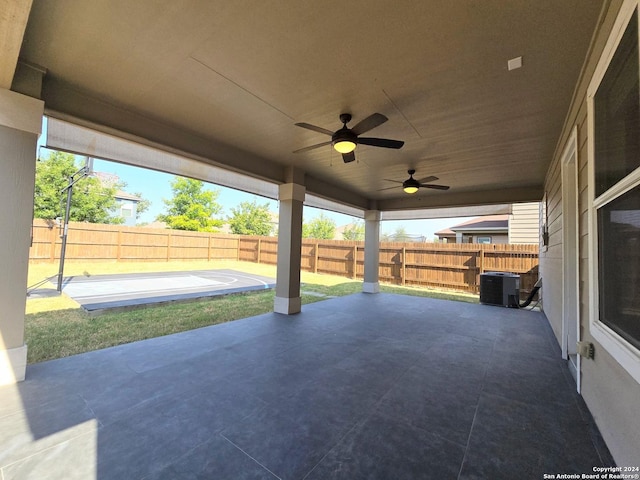 view of patio with ceiling fan, central AC unit, and a fenced backyard