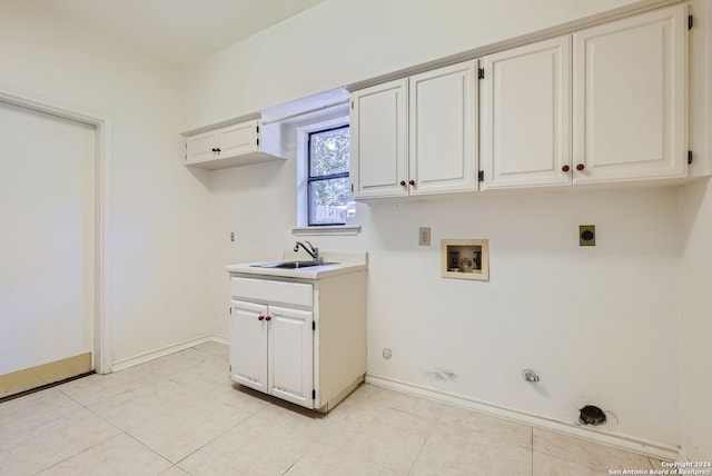 laundry room featuring washer hookup, hookup for an electric dryer, light tile patterned floors, sink, and hookup for a gas dryer