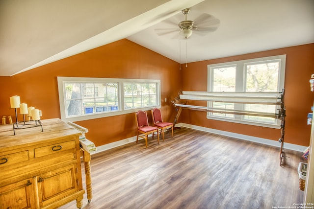 sitting room featuring ceiling fan, vaulted ceiling, light hardwood / wood-style flooring, and a healthy amount of sunlight