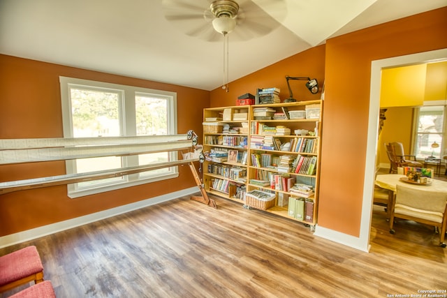 interior space featuring ceiling fan, lofted ceiling, and hardwood / wood-style floors